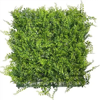 Kunstmuru valgete lilledega